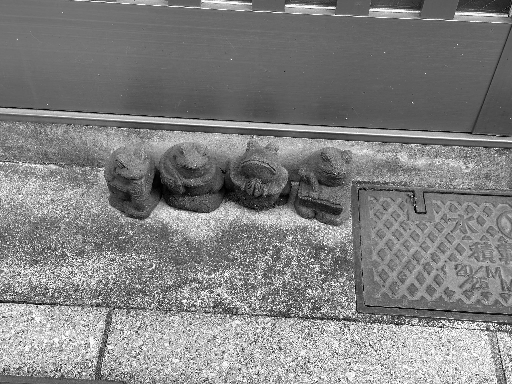 Figures Along the Wall